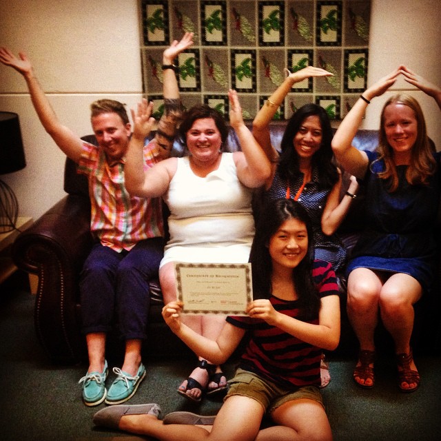 It's fun to intern with the Y-W-C-A! GirlsFirst summer intern Leyi Lei (front) strikes a pose with members of YWCA Seattle | King | Snohomish's Community Engagement team. As part of her internship, Leyi wrote today's blog post about the importance of voting. Photo credit: Katie Barnett.